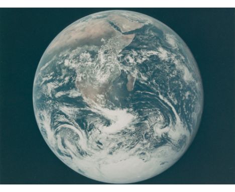 Harrison Schmitt, Eugene Cernan or Ronald EvansThe "Blue Marble", the first photograph of the full Earth seen by human eyes7 