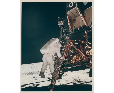 Neil Armstrong Buzz Aldrin on the ladder is about to jump down to the footpad to walk on the lunar surface20 July 1969Vintage