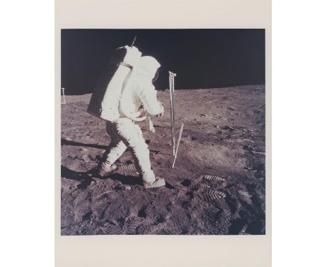 Neil Armstrong Buzz Aldrin pounding in a core sample tube next to the Solar Wind Collector20 July 1969Vintage chromogenic pri