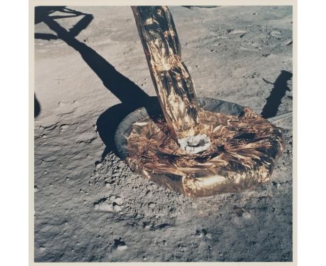 Buzz AldrinA pair of photographs:1) The golden footpad of the Lunar Module against the lunar soil20 July 1969Vintage chromoge