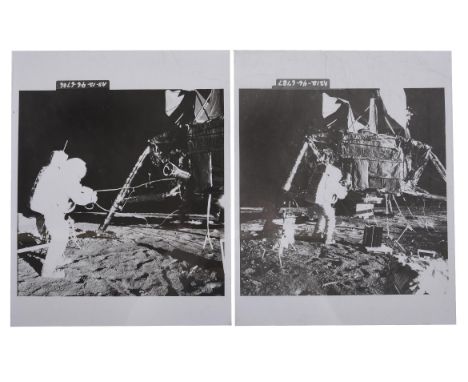 Pete ConradTwo consecutive photographs of Alan Bean unpacking scientific instruments. Bean is trying to remove a radioactive 