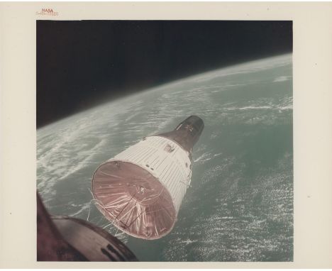 Walter Schirra or Thomas StaffordGemini 7 spacecraft with the backdrop of Earth as seen during rendezvous15 December 1965Vint