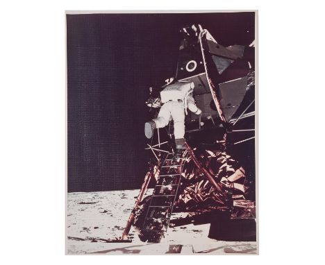 Neil ArmstrongBuzz Aldrin egresses the Lunar Module "Eagle" and begins to descend the steps of the LM ladder as he prepares t