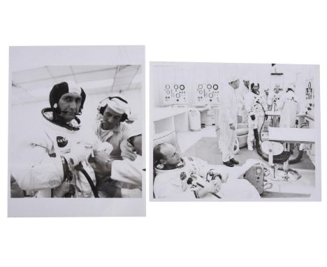 NASAThe Apollo 12 crew during training and preparation for launch: Pete Conrad and Alan Bean discussing flight procedures in 