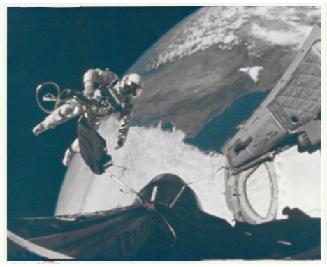 Television camera onboard Gemini 4 spacecraftEd White floats in zero gravity during the first American spacewalk3 June 1965 V