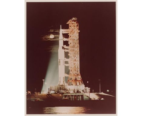 NASAThe last Saturn V "Moon" rocket with the full Moon in the background, Kennedy Space Center's Pad 39A7 December 1972Vintag