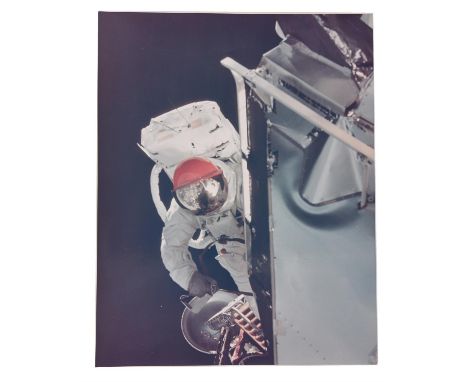 Dave ScottRussell Schweickart performs an EVA while being photographed by Scott from the hatch of the Command Module 6 March 