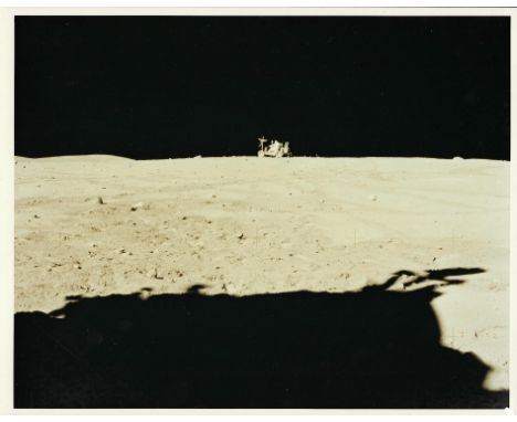 Charles DukeAt the end of EVA3 John Young drives the Lunar Rover to its final parking point known as "VIP point". A televisio