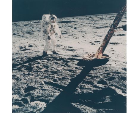 Neil ArmstrongBuzz Aldrin walks on the lunar surface near a leg of the Lunar Module 20 July 1969Large format vintage chromoge