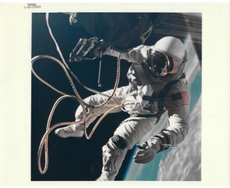 James McDivittEd White performing the first American spacewalk with the brilliant blue of the Earth in the background3 June 1