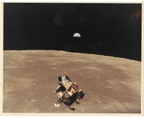 Michael CollinsEarth rises above the Moon's horizon as the Lunar Module ascends towards the Command Module16-24 July 1969Vint