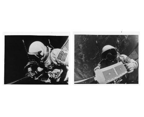 James Lovell1) Stand up EVA; Buzz Aldrin prepares to attach the Mauer camera to the spacecraft2) Buzz Aldrin carries micromet