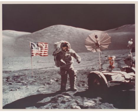 Harrison SchmittPortrait of astronaut Eugene Cernan, the last explorer of another world, pictured with the U.S. flag and Luna