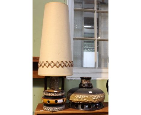 A mid-century ceramic table lamp base with shade together with a similar example