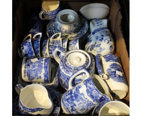 A tray box containing a selection of vintage blue and white china