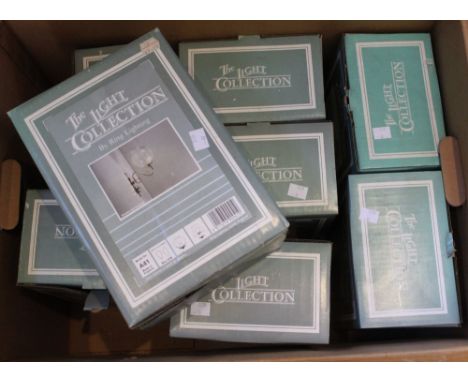 A box containing eight new and unused wall lights "The Light Collection" by Ring Lighting