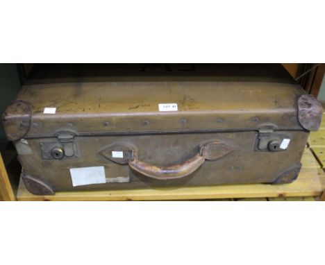 A vintage suitcase with Southern Railway label initialled F.W. to the top