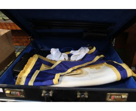A black briefcase containing a selection of Masonic regalia