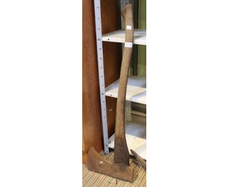 A large vintage wooden shafted axe