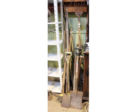 A collection of vintage wooden shafted mainly garden hand tools