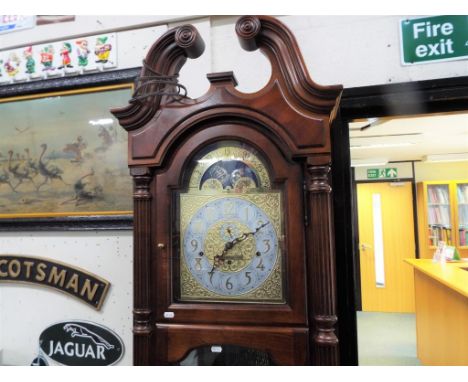 A contemporary longcase clock, the dial marked Howard Miller 66th Anniversary Edition,   the German eight day movement striki