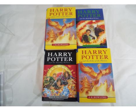 Harry Potter - four Harry Potter first edition hardback books comprising The Order of the Pheonix, The Deathly Hallows and Th