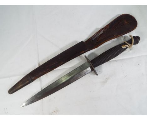 A WW2 (World War Two) sterile 3rd Pattern Army Commando Fairbairn Sykes FS Fighting Knife original leather sheath.  Est £100 