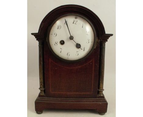 An X.L. Registered mahogany cased mantel clock, with chiming movement, height 10.5ins