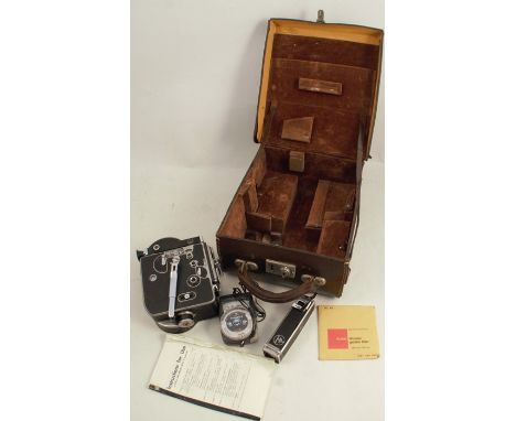 A Paillard Bolex H16 16mm camera, with Gossen Lunasix 3 light meter and movie books