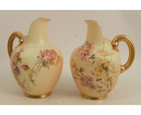 A pair of Royal Worcester blush ivory flat back jugs, decorated with flowers, shape number 1094, circa 1895, height 5insCondi