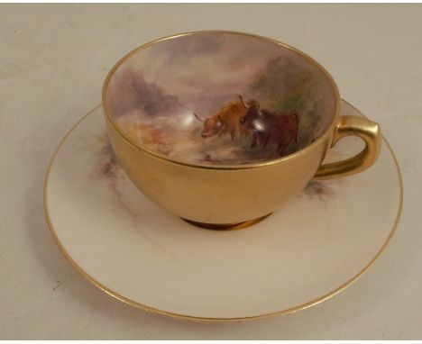 A Royal Worcester cabinet cup and saucer, the interior of the cup and the saucer decorated with Highland cattle in landscape 