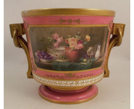 A Royal Worcester jardinière, decorated with rich gilt decoration and two ring handles, the pink ground surrounding a panel o