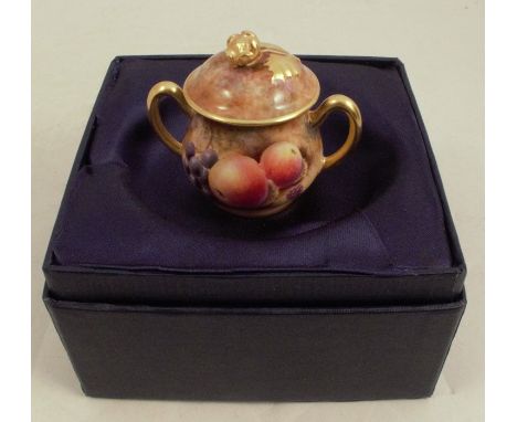 A Royal Worcester miniature sugar box and cover, decorated with fruit to a mossy background by Bowman, boxedCondition Report: