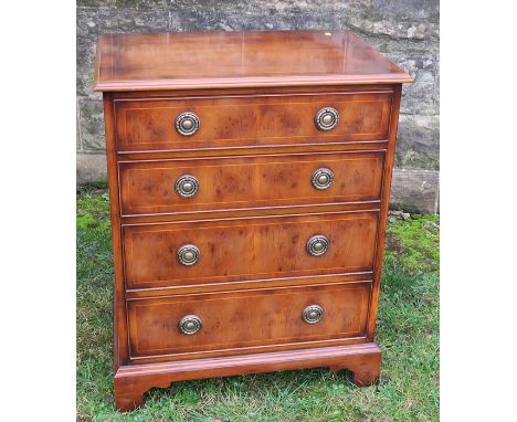 A Rackstraw reproduction yew wood chest, of four long drawers, on bracket feet, 24ins x 15.5ins, height 30ins