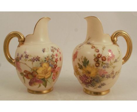 A pair of Royal Worcester blush ivory flat back jugs, decorated with floral sprays, shape number 1094, dated 1904, height 5.2