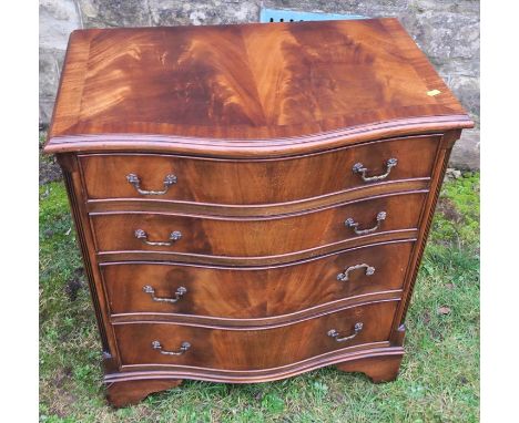 A reproduction mahogany serpentine chest, of four long drawers, raised on bracket feet, 28ins x 18ins, height 31ins