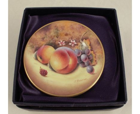A Royal Worcester miniature side plate, decorated with fruit to a mossy background by Bowman, boxed, diameter 3.25insConditio