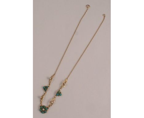 A turquoise and cultured pearl necklace, unmarked, the stone set frontispiece to a back chain, 41cm long, 7.7g gross