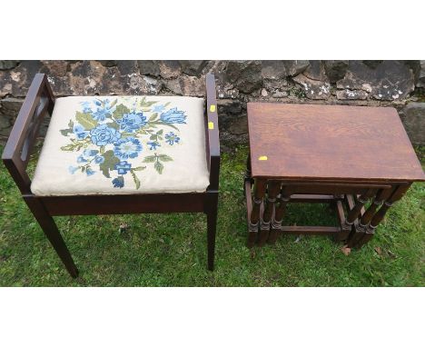 A mahogany piano stool, with tapestry hinged seat, together with a nest of three tables