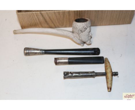 A clay pipe together with two silver mounted cheroot holders etc