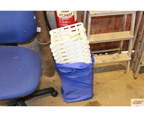 A plastic folding emergency escape ladder in bag