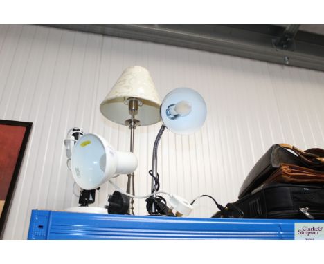 An adjustable reading lamp, a table lamp and an Angle Poise style lamp
