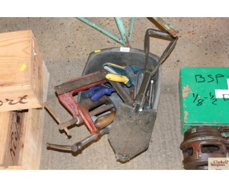 A quantity of tools to include a small digging spade; G clamps etc