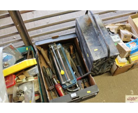 A box of tools and a tall folding tool box