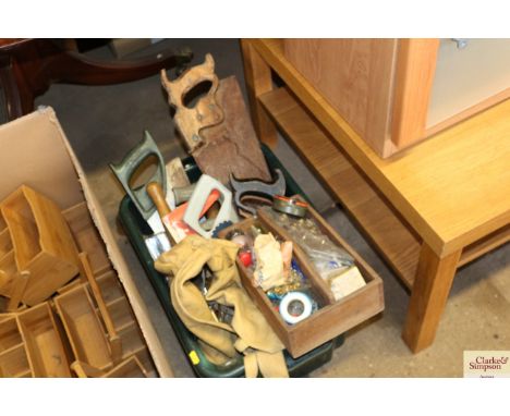 A box of tools including saws; shears etc