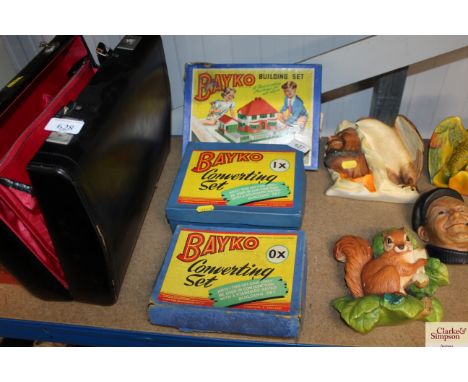 Three boxes containing Bayko building sets