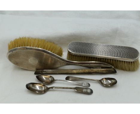 A small selection of HM silver including brushes with engine turned chequered decoration, Victorian Scottish silver teaspoon 