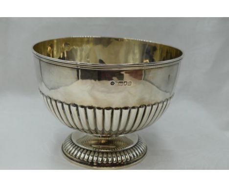A Victorian silver rose bowl having rub over rim, gadrooned decoration and pedestal foot, London 1899, William Hutton &amp; S