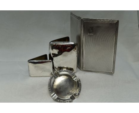 A selection of HM silver smoking related items including small ash tray, a large cigarette case having engine turned decorati