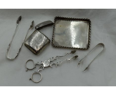 A selection of HM silver and white metal including scissor sugar nips of traditional form bearing monogram and aged repair, m